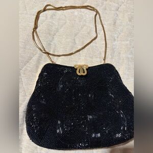 Chic Black Beaded Clutch with Gold Accents